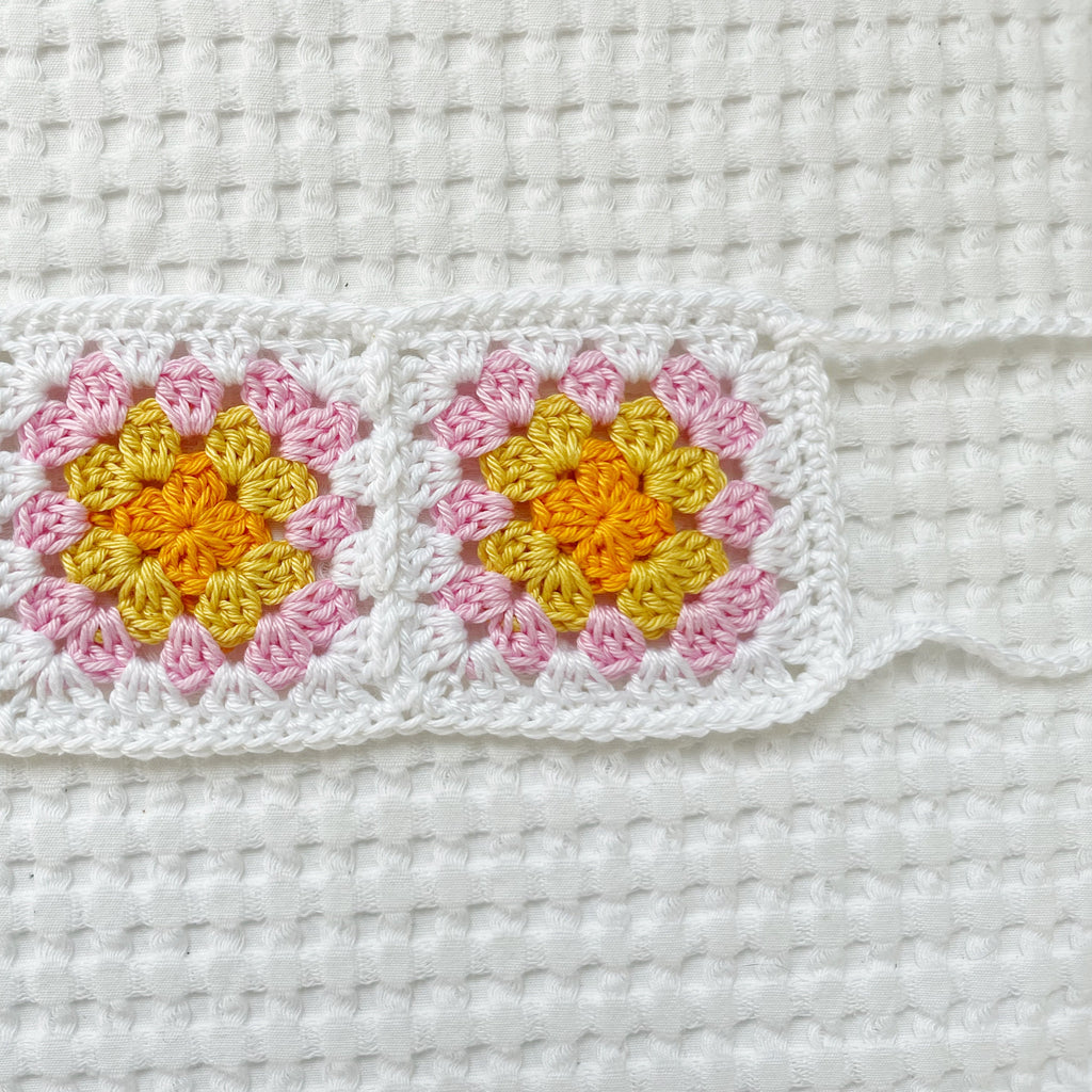 Close-up of a crocheted headband.